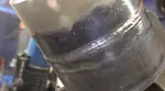 Video shows tips for passing a pipe welding test using 6010 for the root
