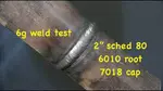 Video shows tips for passing a 6g weld test with 6010 3/32" root and 7018 cap ua-8